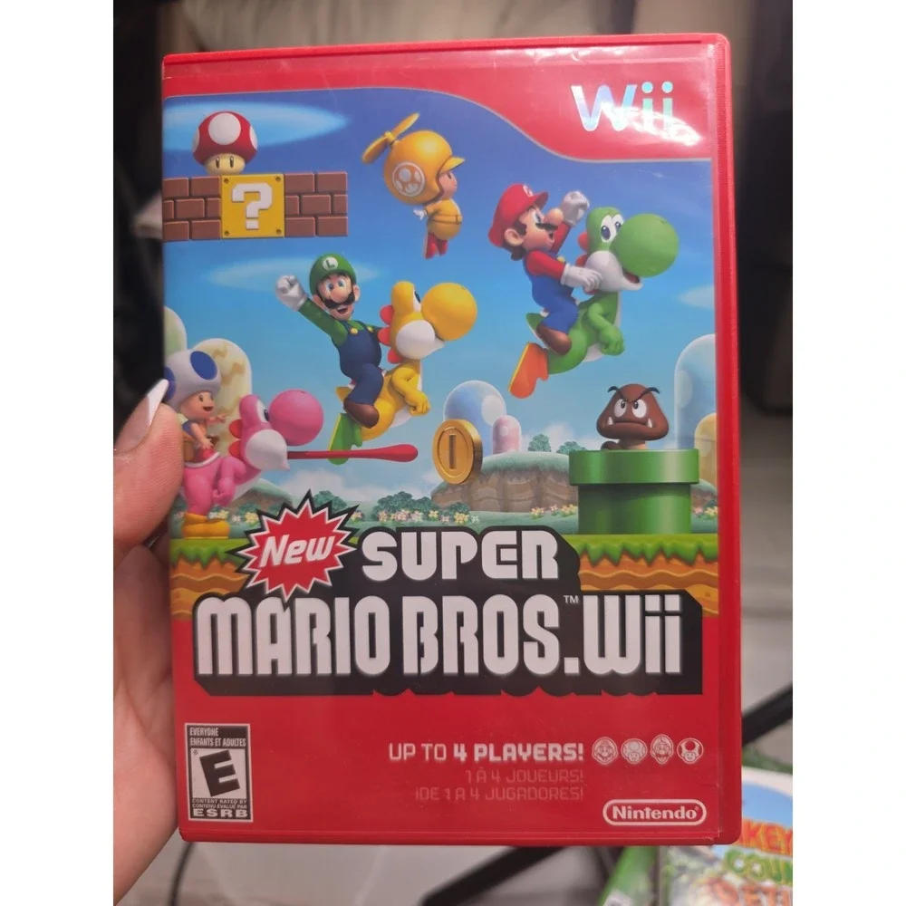 Nintendo New Super Mario Bros. Wii (Wii) Multiplayer E NTSC-U/C Super Mario